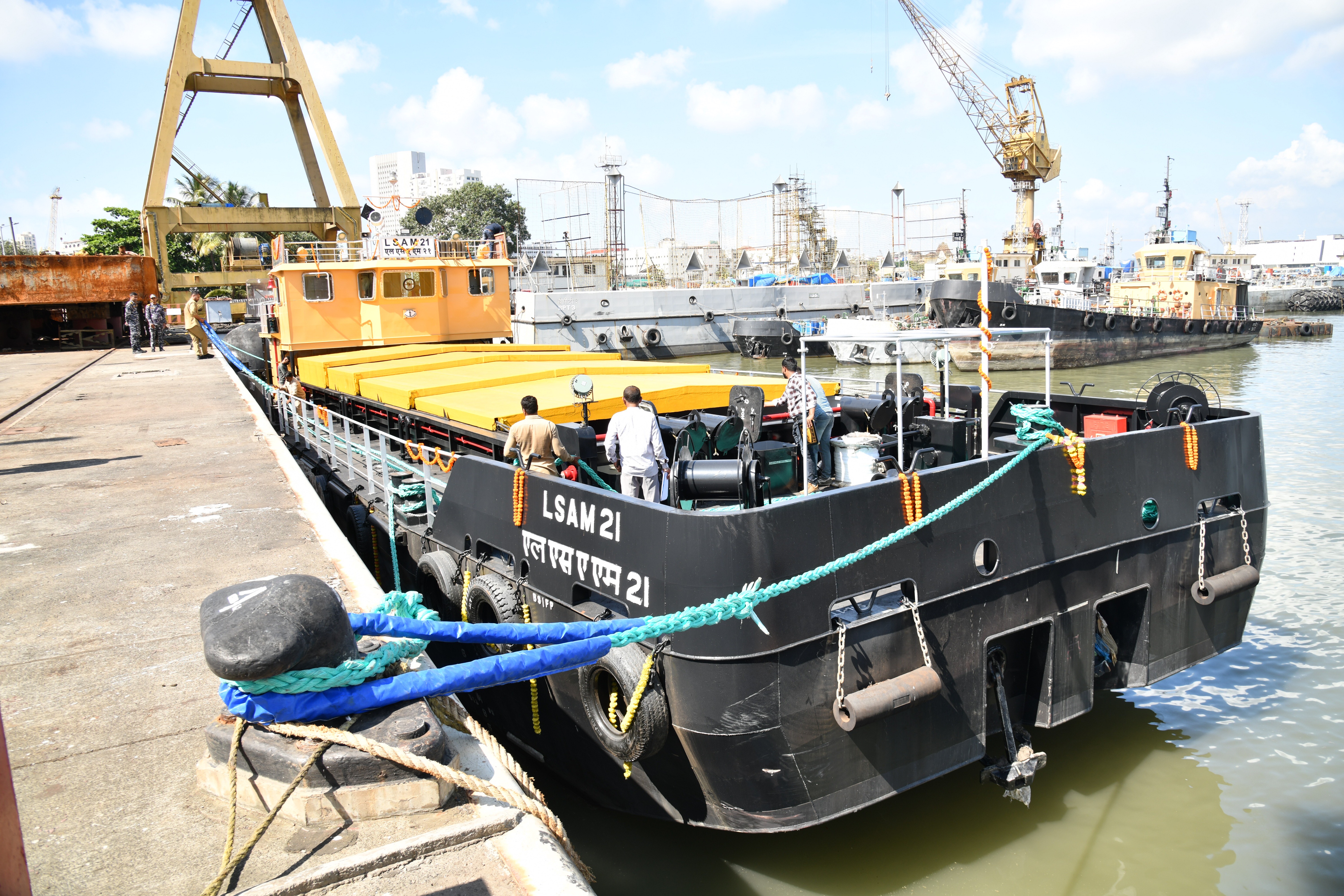 Delivery of Ammunition Cum Torpedo Cum Missile Barge, LSAM 21 (Yard 131)