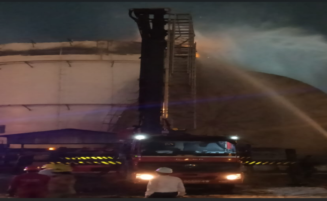 Indian Navy's Seaking Helicopter was deployed with an underslung fire bucket to assist in dousing the blaze