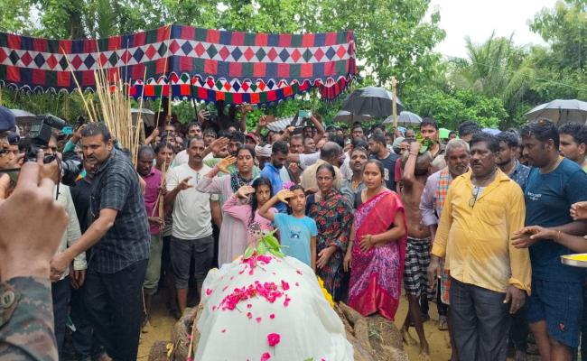 Officials from The Indian Army, India Nnavy, District Administration, Police Department, and NCC Paid Tributes to Battle Casualty CFN Gottapu Sankara Rao of Armoured Workshop During his Funeral at his Native Village in Bandangi, Vizianagaram District on 1
